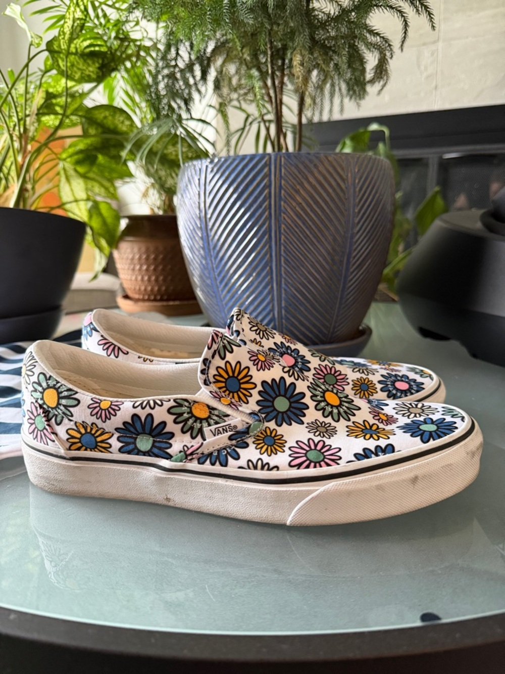 Vans White Slip-On Sneakers with Multicolor Daisy Pattern